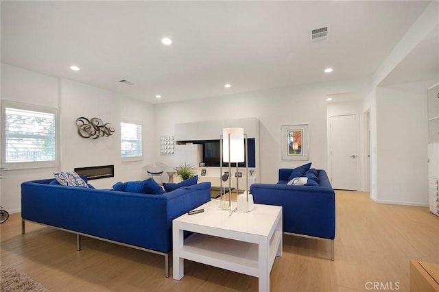 living room featuring light hardwood / wood-style floors