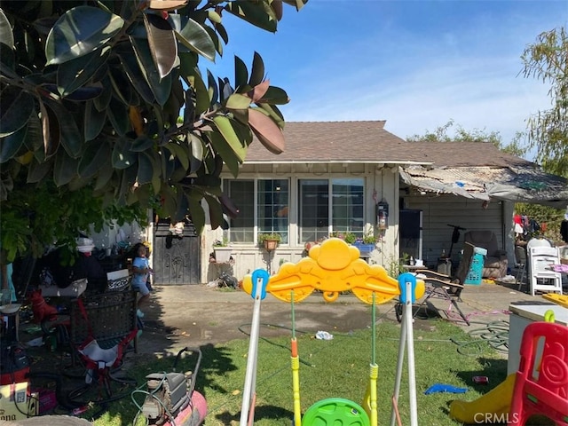 exterior space with a yard and a patio area