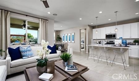 living room featuring ceiling fan