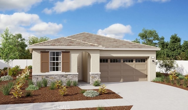 view of front of home with a garage