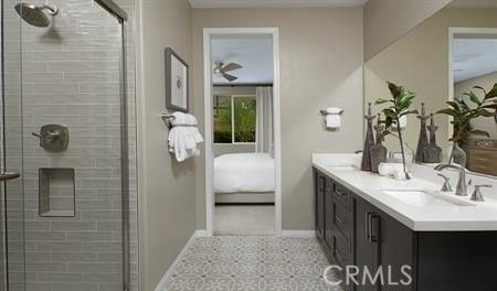 bathroom featuring vanity and an enclosed shower