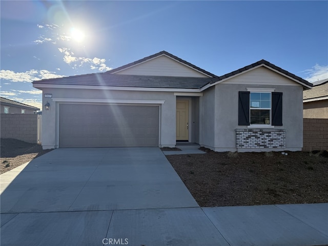 single story home with a garage