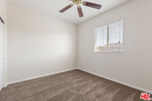 unfurnished room with carpet floors and ceiling fan