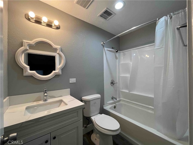 full bathroom with vanity, toilet, and shower / bath combo