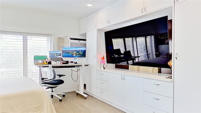 home office featuring light hardwood / wood-style flooring