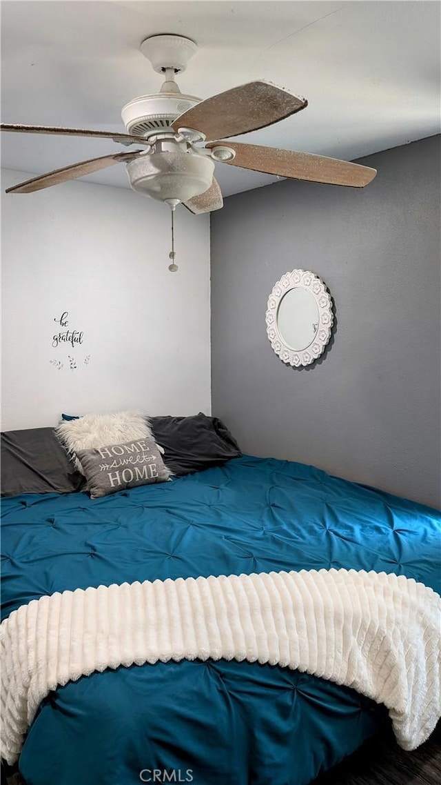 unfurnished bedroom with ceiling fan