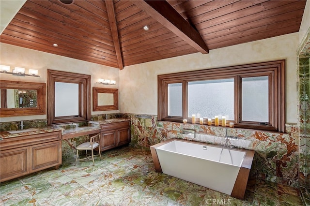 bathroom featuring vanity, tile walls, a tub to relax in, vaulted ceiling with beams, and wooden ceiling