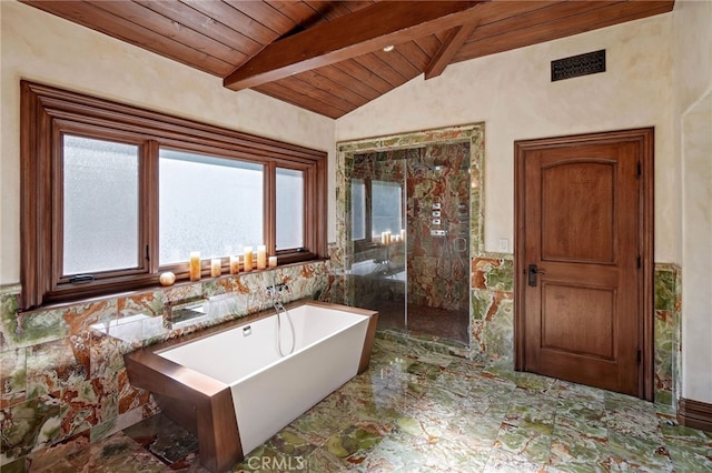 bathroom with wooden ceiling, tile walls, lofted ceiling with beams, and separate shower and tub