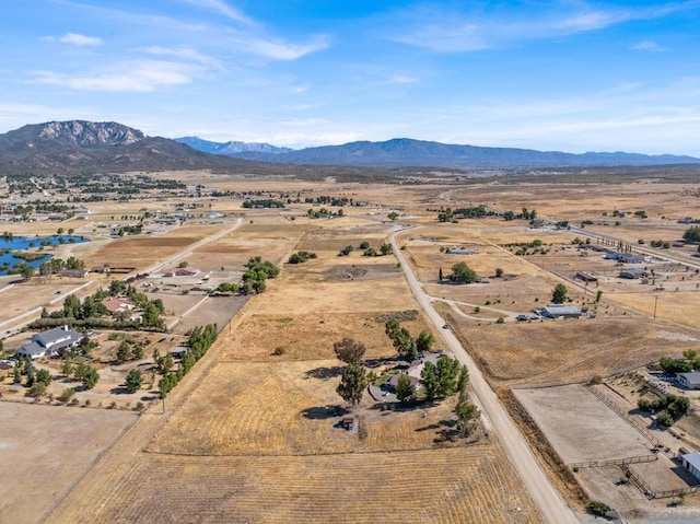 aerial view with a mountain view and a rural view