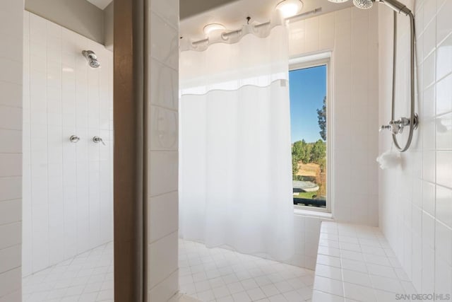 bathroom featuring walk in shower