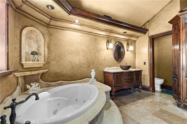 bathroom featuring vanity, a bathtub, toilet, ornamental molding, and vaulted ceiling