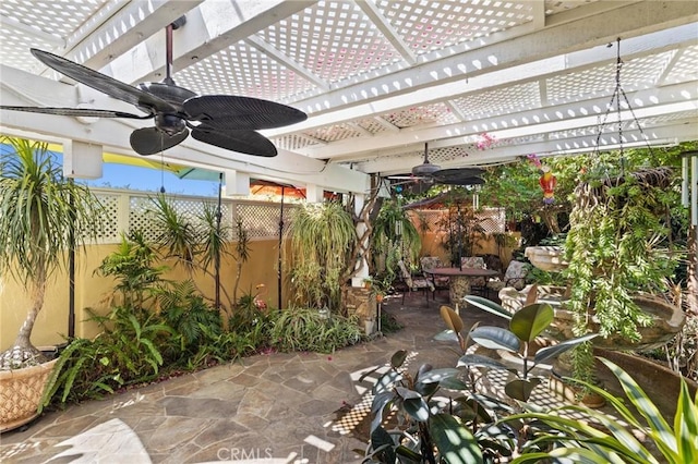 view of patio featuring ceiling fan and a pergola