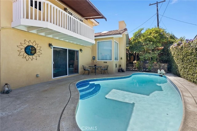 view of pool with a patio area