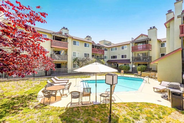 view of pool featuring a patio