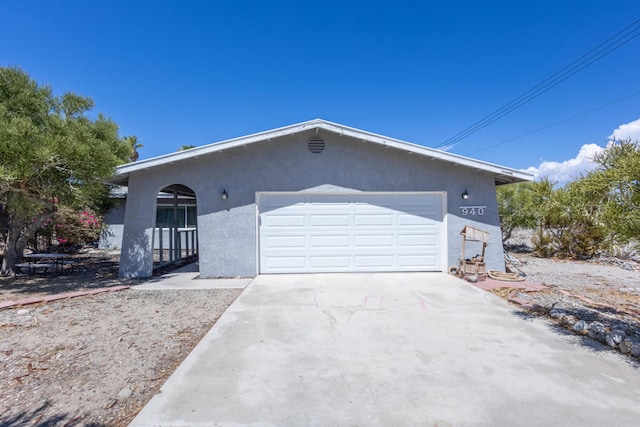 single story home with a garage