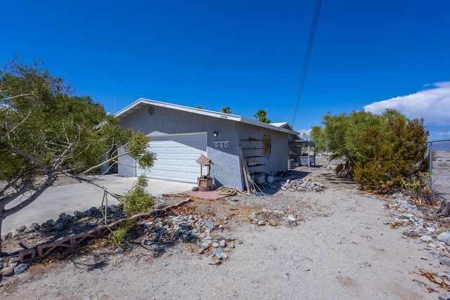 view of home's exterior featuring a garage