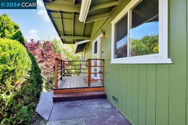 exterior space featuring a wooden deck