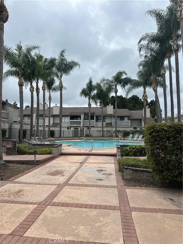 pool featuring fence