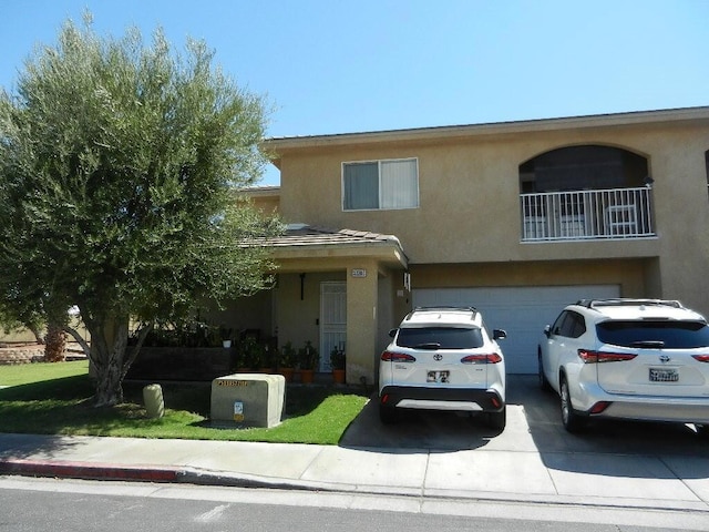 view of front of property with a garage