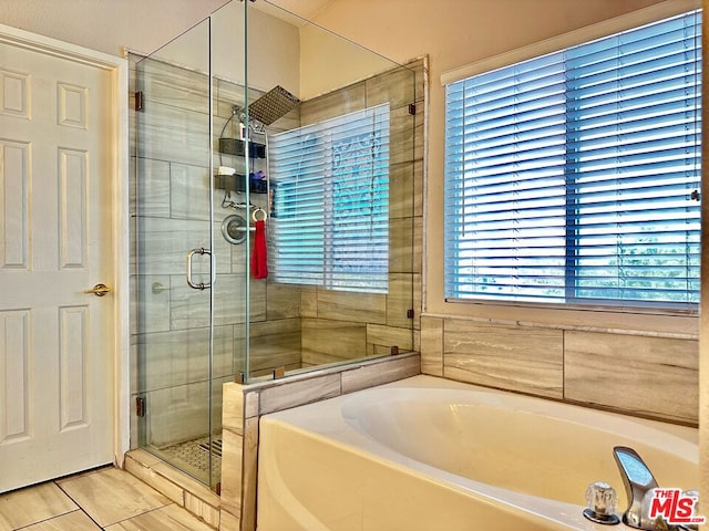 bathroom with plus walk in shower and tile patterned floors