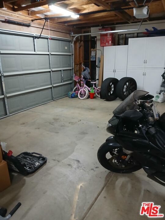 garage with a garage door opener