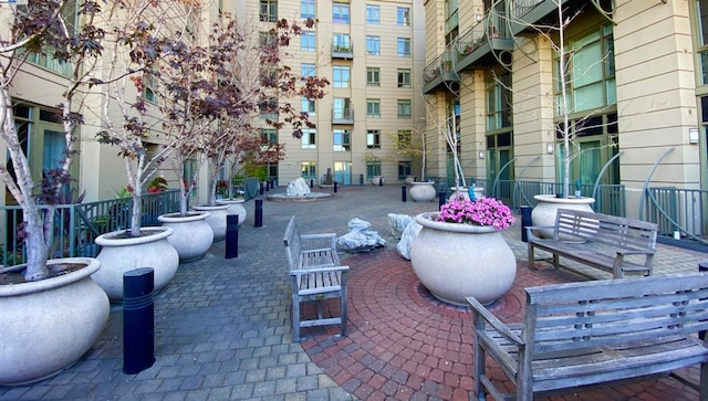 view of property's community with a patio area