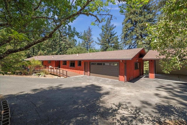 single story home with a garage