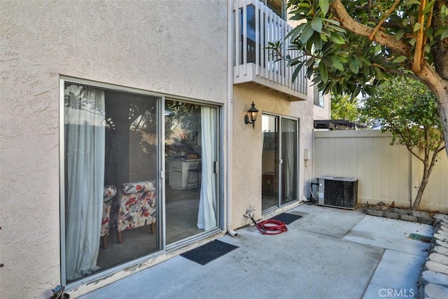 view of patio / terrace with a balcony and central AC