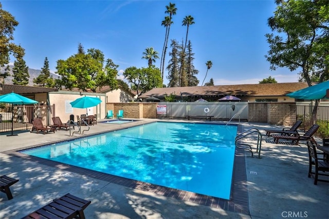 view of pool featuring a patio