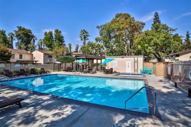 view of pool featuring a patio