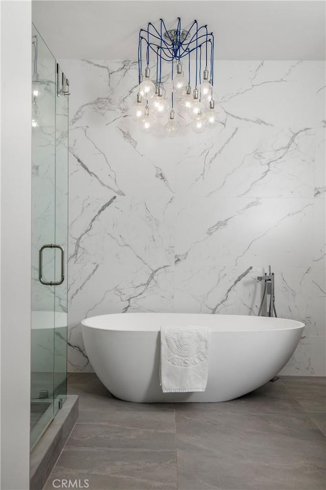 547 Temple Hills Dr, Laguna Beach, CA 92651 - bathroom featuring a marble finish shower, a soaking tub, marble finish floors, and a chandelier