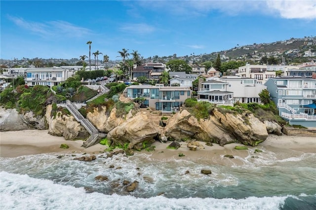 birds eye view of property featuring a residential view and a water view