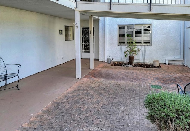 view of patio with a balcony