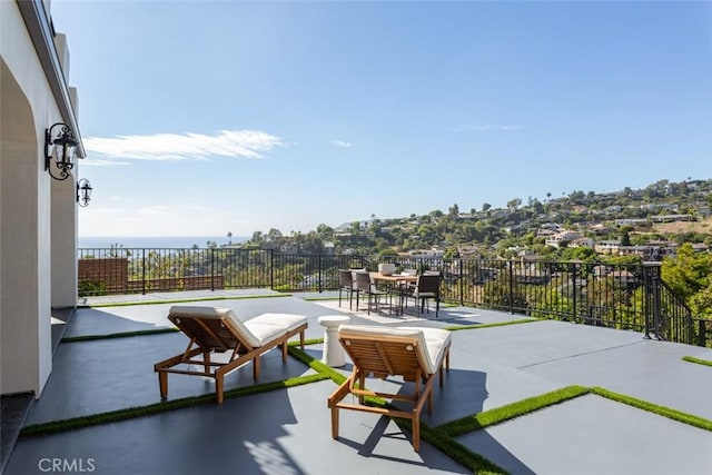 view of patio / terrace featuring a water view