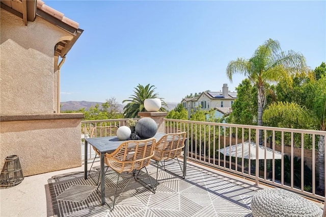 balcony featuring a mountain view