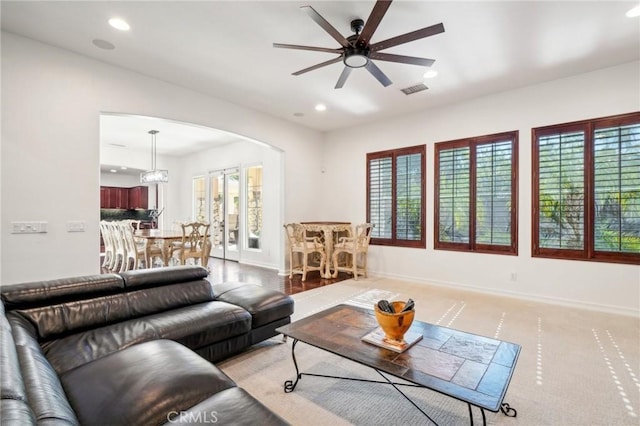 living room with ceiling fan