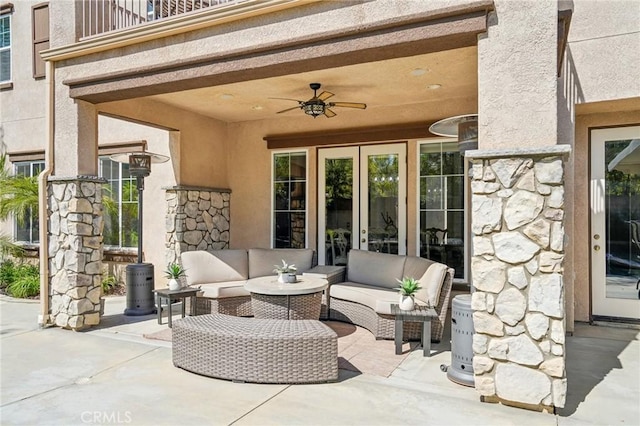 view of patio / terrace with an outdoor hangout area, a balcony, and ceiling fan