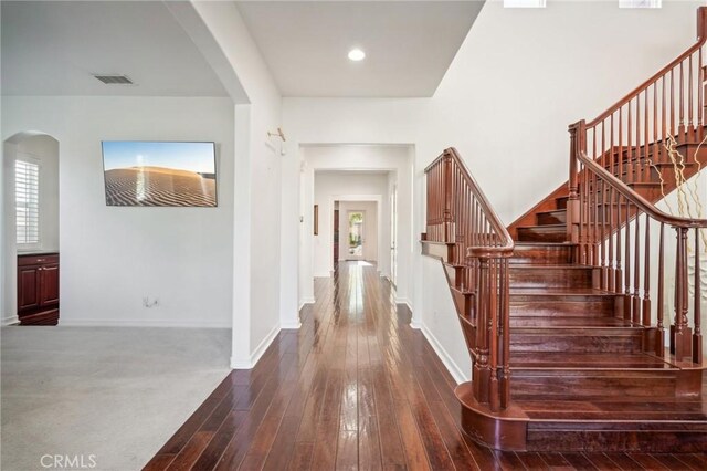 entryway with hardwood / wood-style flooring