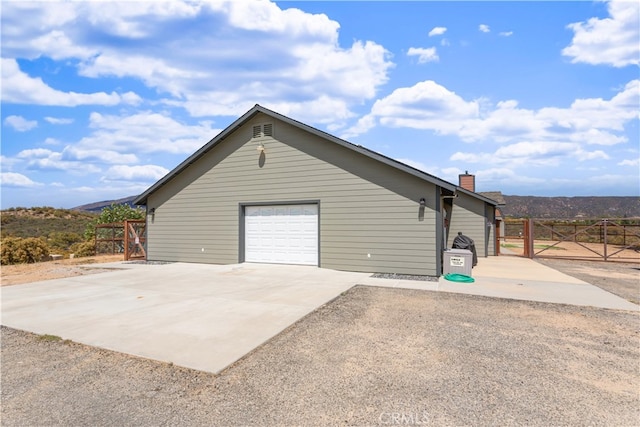 garage featuring a mountain view