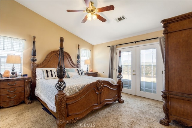 bedroom with lofted ceiling, ceiling fan, french doors, access to outside, and light colored carpet