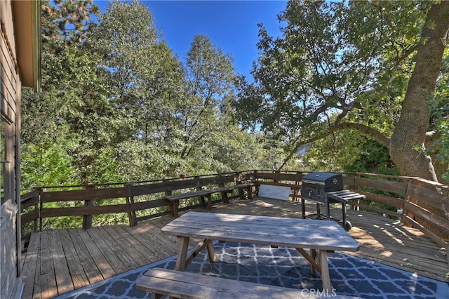 wooden terrace with grilling area