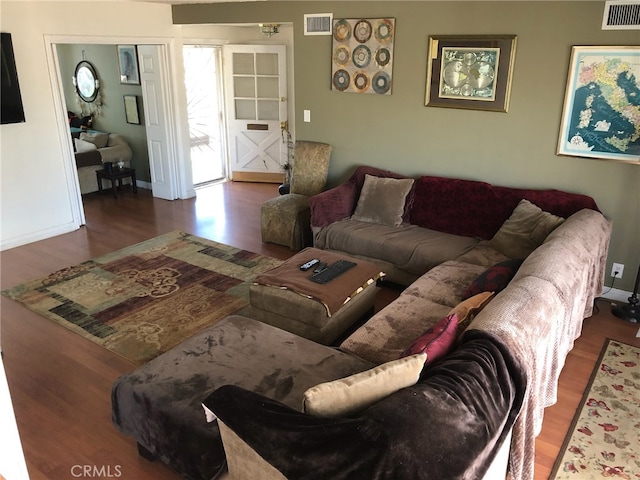 living room featuring wood-type flooring