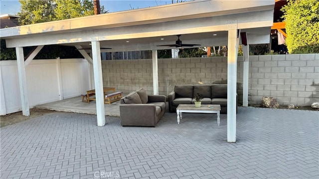 view of patio / terrace featuring outdoor lounge area and ceiling fan