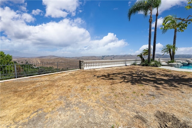 view of yard with a mountain view