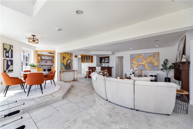 living room with light tile patterned floors