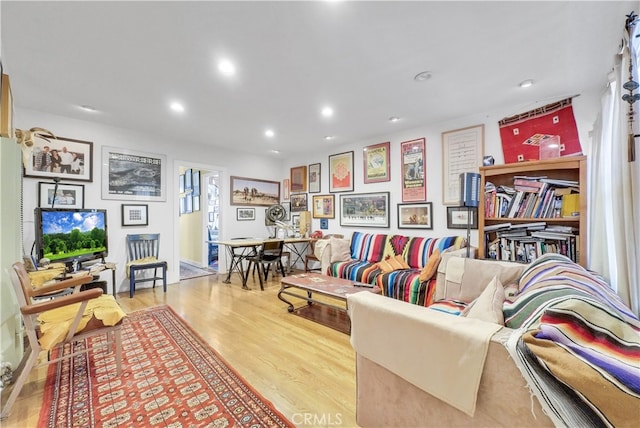 living room with light hardwood / wood-style floors