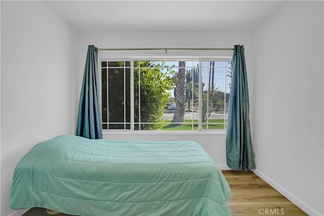 bedroom featuring light hardwood / wood-style floors