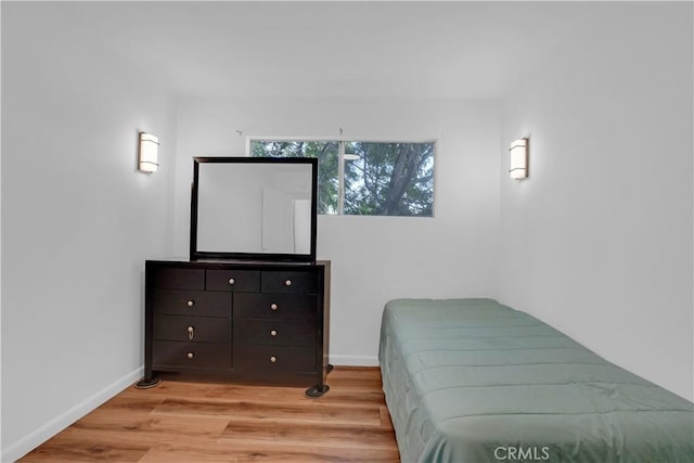 bedroom featuring light hardwood / wood-style flooring