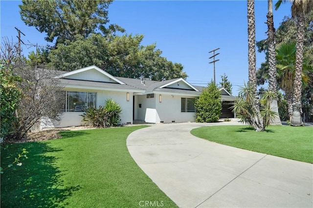 ranch-style house featuring a front yard