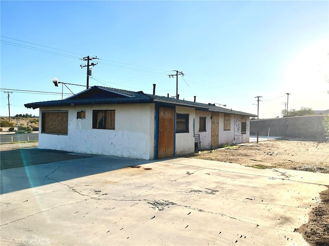 exterior space with a patio area